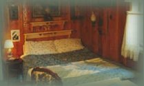 cabins at gathering light retreat located near crater lake national park and klamath basin birding trails in southern oregon: Bedroom in cabin 5. cabins, tree houses, vacation rentals in southern oregon near crater lake national park and klamath basin birding trails.
