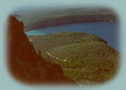 paulina lake and the obsidian flow photographed from paulina peak in newberry crater volcanic national monument.