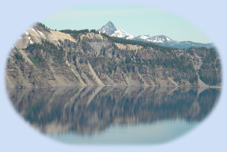 crater lake photographed from the western rim at crater lake national park in the cascade mountains of oregon: hiking trails up garfield peak, godfrey glen, watchman tower, cleetwood trail down the rim to the lake and boat rides, up mt scott.