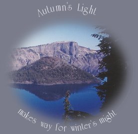 wizard island near twilight at crater lake national park in the cascade mountains of oregon.