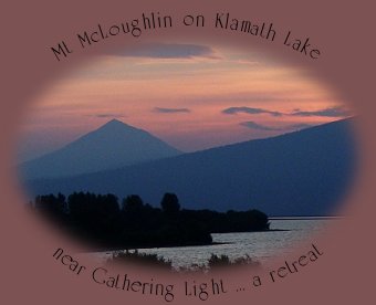 mt mcloughlin towering over klamath lake near gathering light ... a retreat in southern oregon near crater lake national park: cabins, tree houses in the forest on the river.