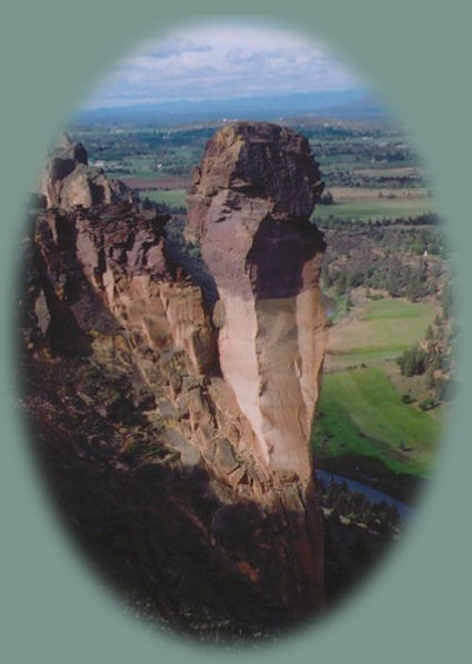 Monkey face hiking atop misery ridge at smith rock. smith rock is world renowned for rock climbing and hiking, and it's located north of newberry crater national monument, not far from the deschutes ochoco national forest, mountain lakes, hiking trails, the wild and scenic deschutes river, the cascade mountains, waterfalls; bend in central oregon. 