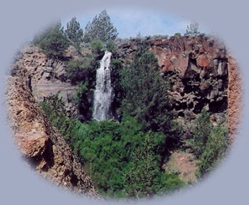 waterfall flowing into the Crooked River that from the cliffs around smith rock.